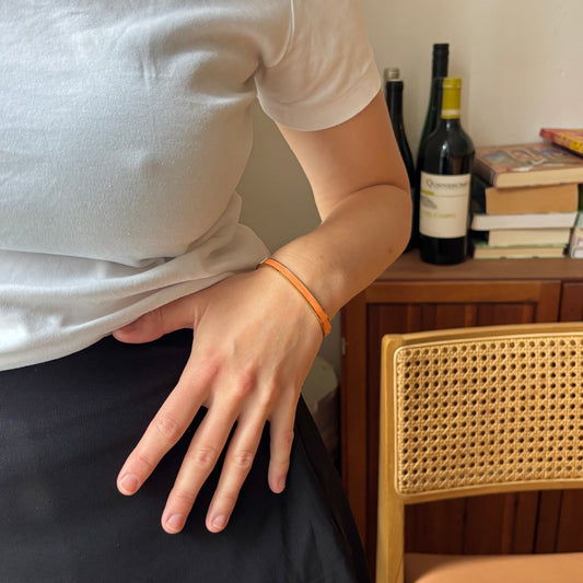 Kaja coral Bangle vandfast på håndled 